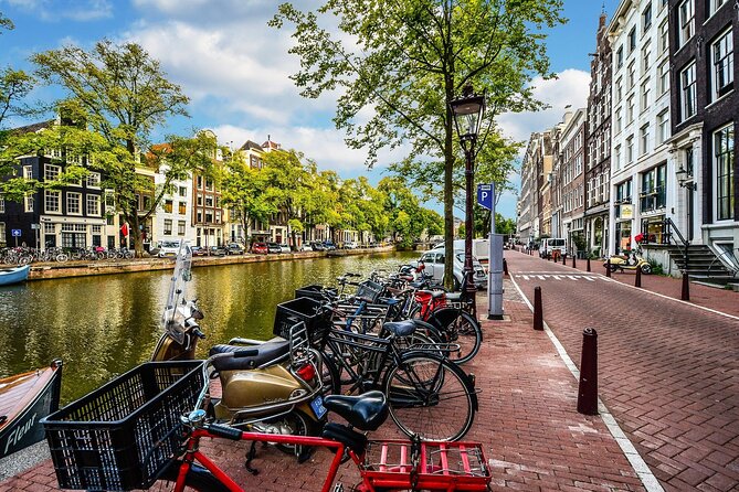 Amsterdam Day Trip from Brussels With Cheese, Clogs and Windmills - Dam Square and the Royal Palace