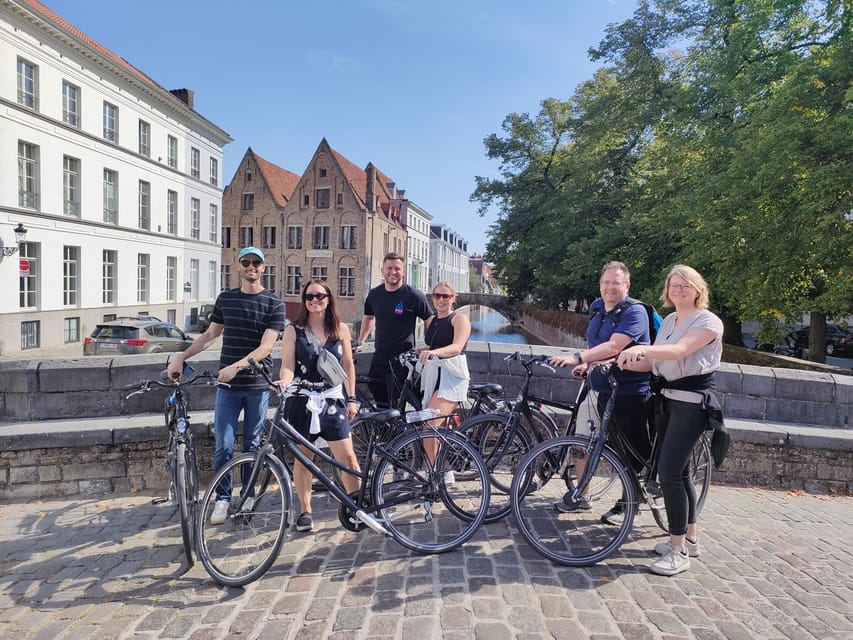 Bruges by bike with family and friends! - Starting beneath the Belfry at Market Square