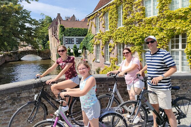 Bruges by bike with friends and family! - Potterie, canal houses, and a remnant from 1127