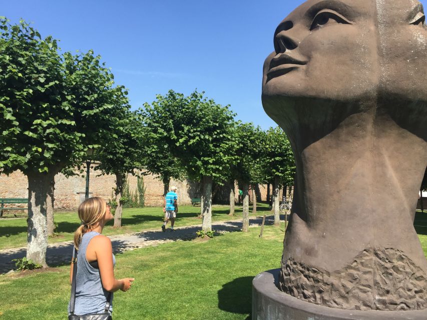 Bruges: Flatlands Guided Bike Tour - Quiet roads, canals, and Belgian cows