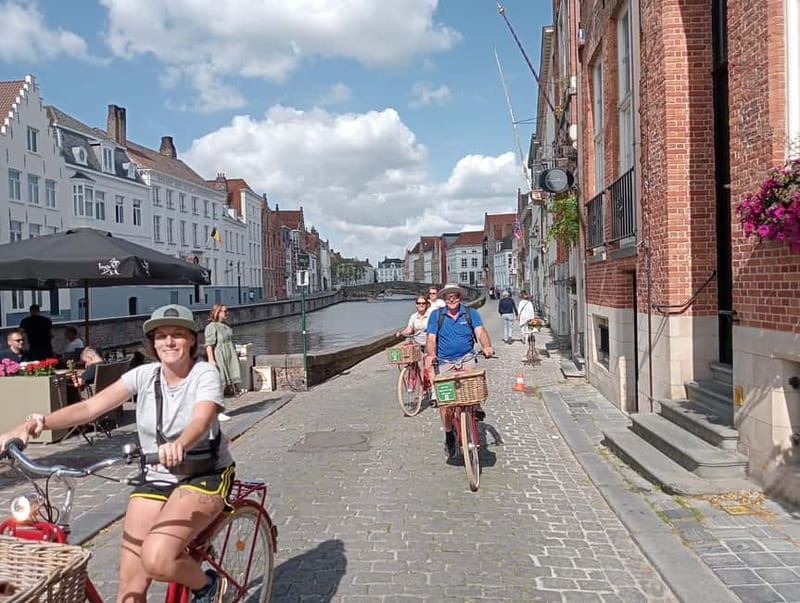 Bruges: Guided Retro Bike Tour of Highlights and Hidden Gems - Canals, bridges, and the view at Rozenhoedkaai