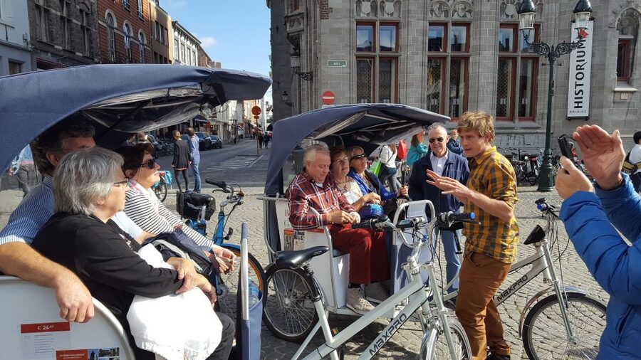 Bruges: Guided Rickshaw Tour - Mobility, comfort, and family use