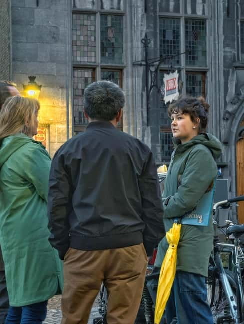 Bruges: Nightly Tales and Untold History Walking Tour - Sint-Jansplein, Kraanplein, and Huis Ter Beurze