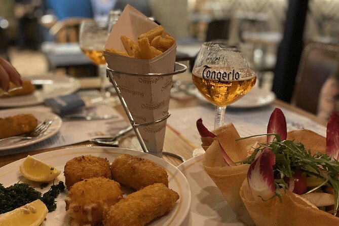 Brussels Food Tour: 10 Tastings of Waffles, Beers, Fries & More - Grand Place and Belgian chocolate with strawberries