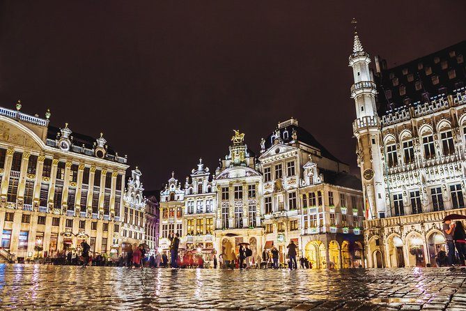 Brussels Private & Personalized Christmas Tour with a Local Guide - A cobbled street with Belgian holiday dining