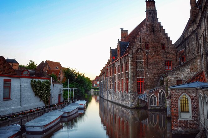 Experience the best of Bruges on a Private Tour with Boat Ride - Burghers’ Lodge and the story behind the façades