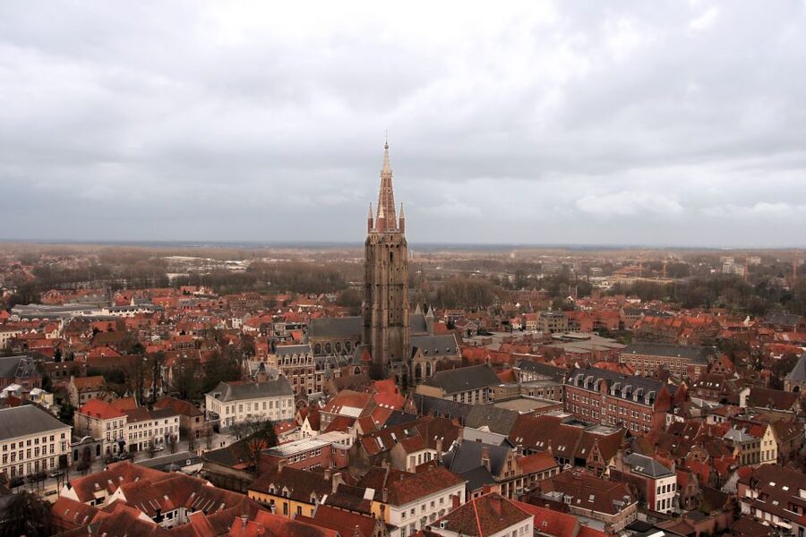 From Amsterdam: Bruges Day Trip in English with Boat Option - Starting at ALOHA Bowling