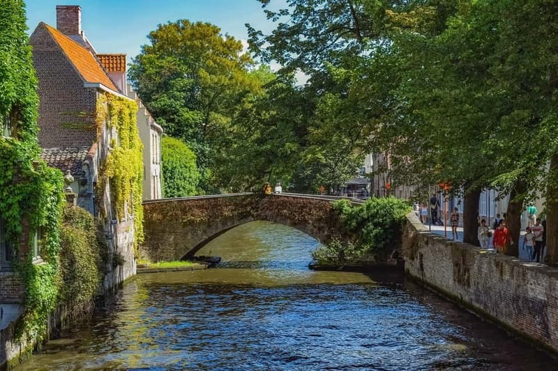 From Amsterdam: Private Sightseeing Tour to Bruges - Leaving Amsterdam in a private car