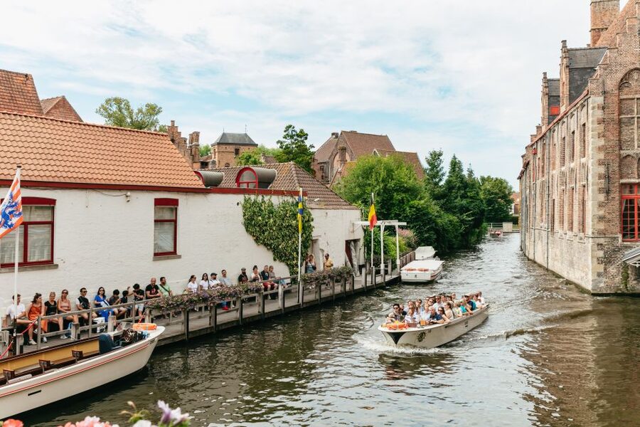 From Brussels: Guided Day Trip to Bruges and Ghent - Ghent in one hour: churches, castles, and the old port
