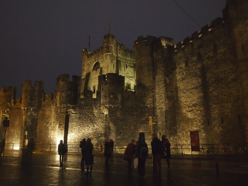 Ghent: The Dark Side of Ghent Private Walking Tour - Starting beneath the red umbrella at Saint Michael’s Bridge