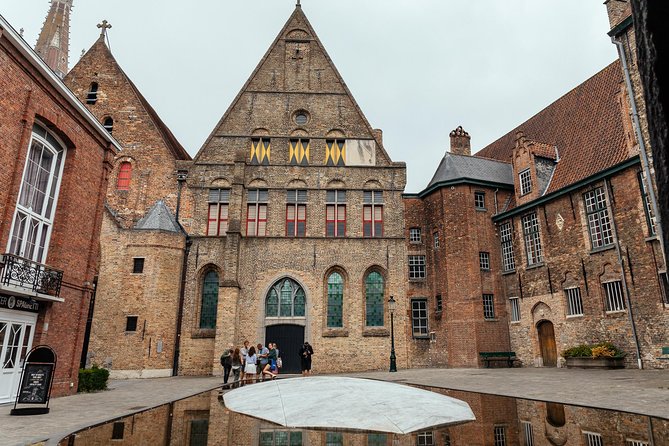 Highlights & Hidden Gems With Locals: Best of Bruges Private Tour - Canals, old bridges, and the quieter side of Bruges