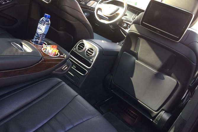 Private Arrival Transfer from Brussels Airport to Bruges with Business car - Meeting your chauffeur at Brussels Airport